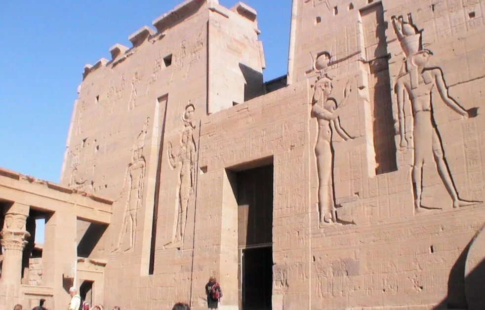 Ancient carvings of Egyptian People on Karnak Temple walls.