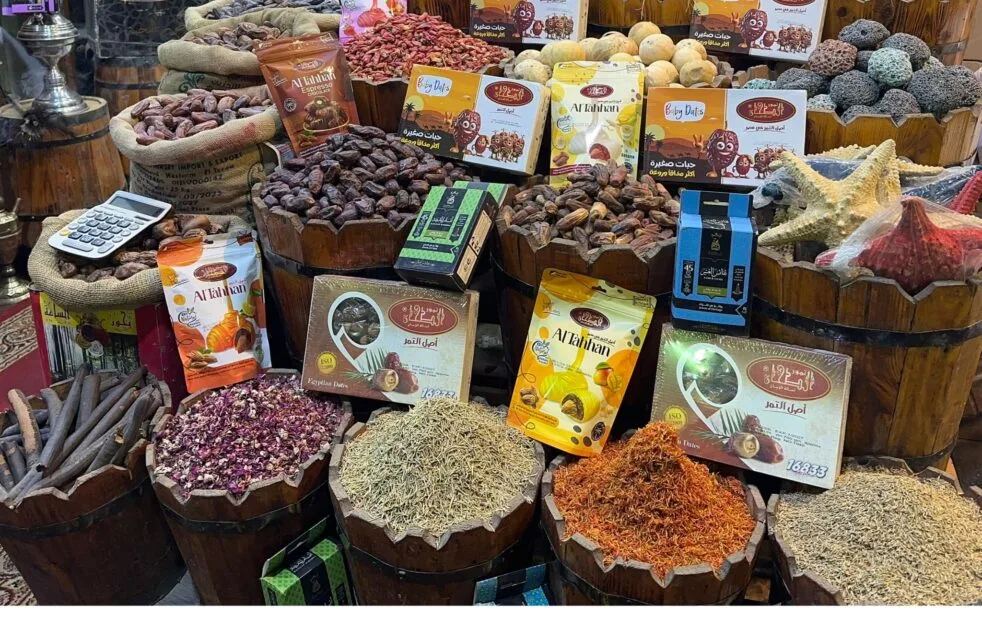 A souk stall selling dates and spices in Aswan.