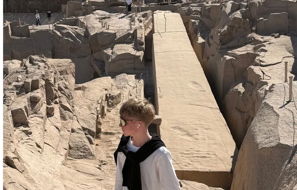 Teen exploring the Unfinished obelisk granite site in Aswan Egypt.