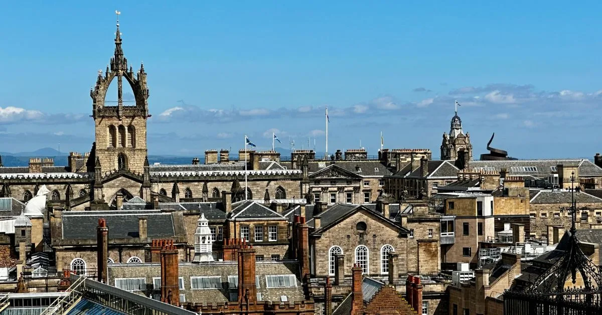 Church spires, flag poles and chimney pots viewed from the Scottish National Museum 7th floor.