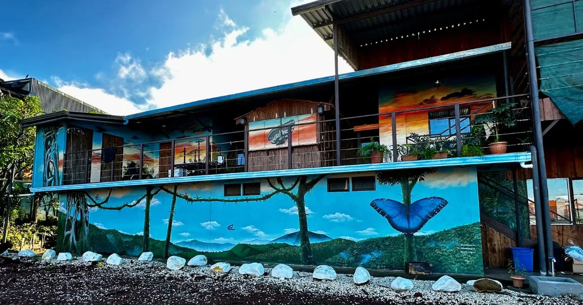 A restaurant called Morpho meaning butterfly.  Images of butterfly on the building which has an upper deck floor.