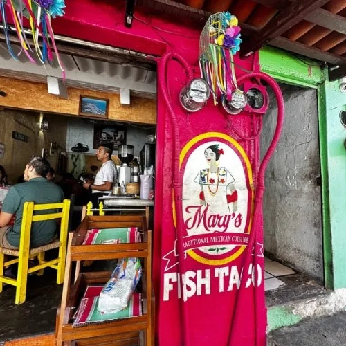 Sign advertising Fish Tacos restaurant.