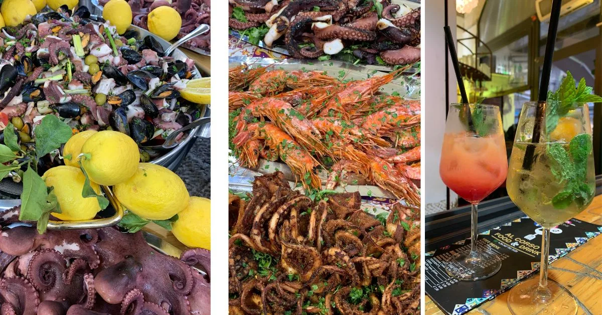 Selection of Italian food lemons, seafood and two drinks which are cocktails