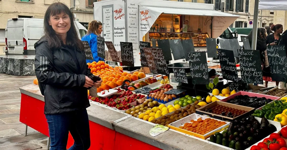 Farmers Market with stalls of fresh fruits and vegetables.
