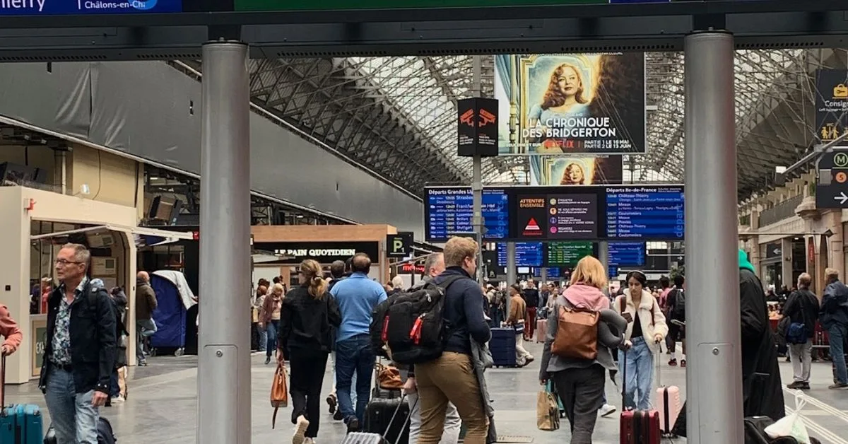 People at a train station in Paris.