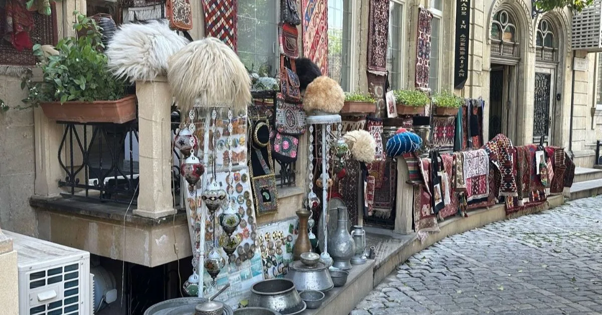 Old Town Baku shop which curves around a cobbled street and displays local handicrafts.