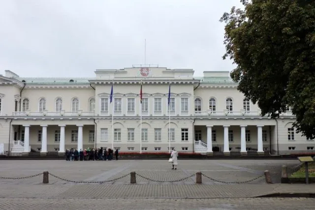 Large white 2 story building is the Presidential Palace in Vilnius Lithuania