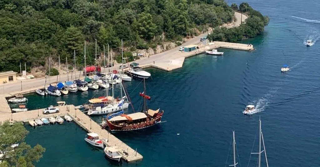 Small Harbour area of Spilla with a dozen small boats moored up