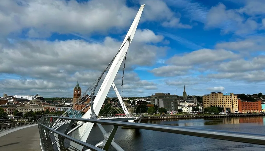 A white bridge called the Peace Bridge links Ebrington and Derry in Northern Ireland and is symbolic of more integrated society hopes.