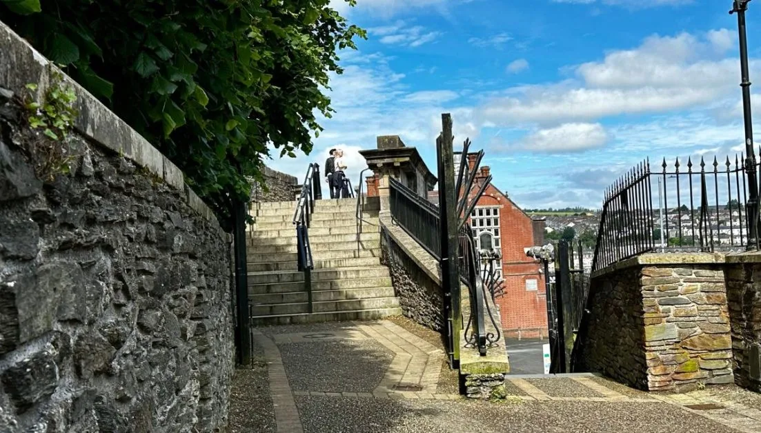 An outdoor stone staircase  as part of the city wall in Derry Northern Ireland.