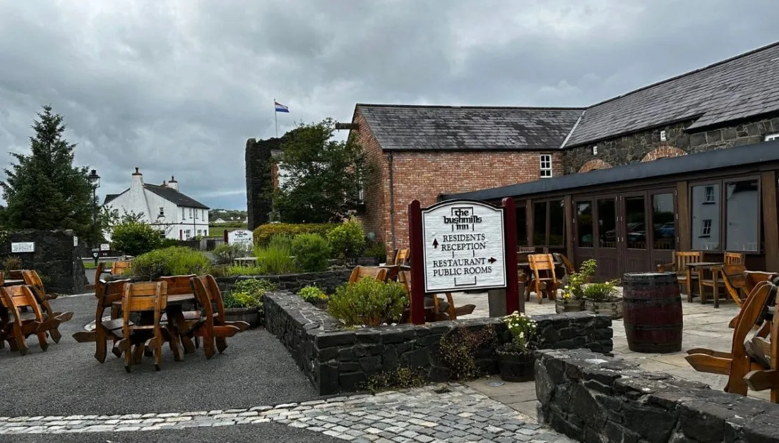 Outdoor seating within a garden at the Bushmills Inn Northern Ireland.