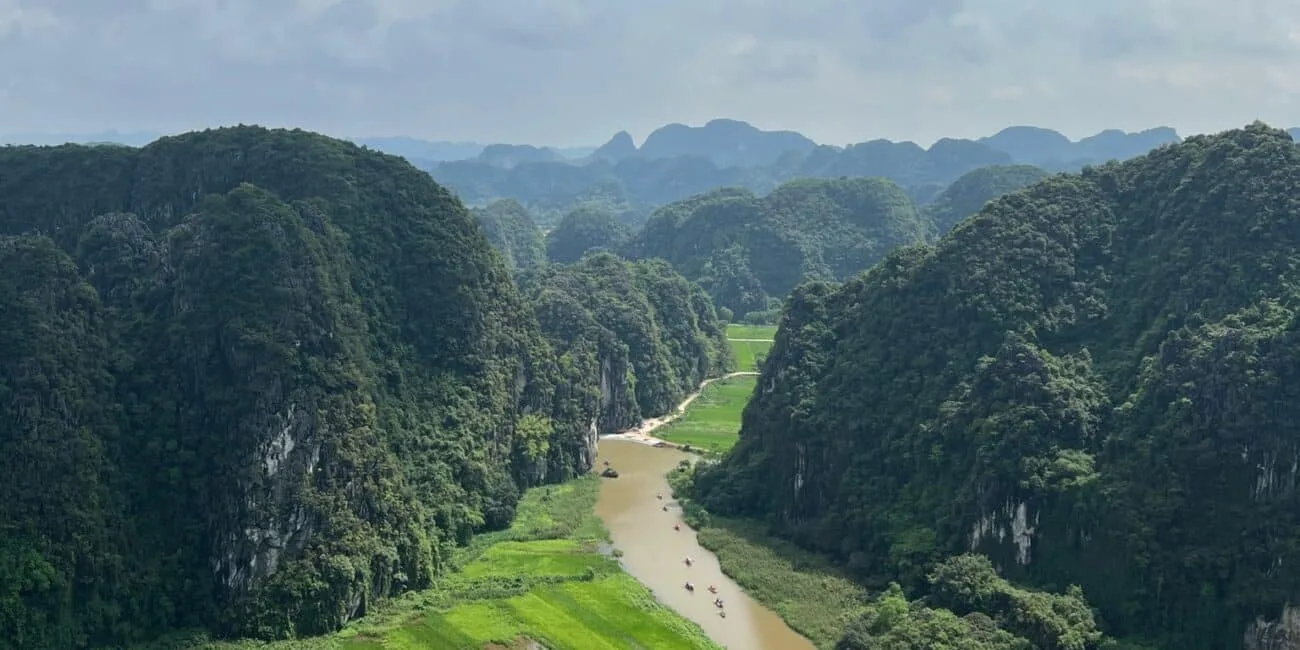 Sapa region of Vietnam with lush jungle and a river in the middle of the view