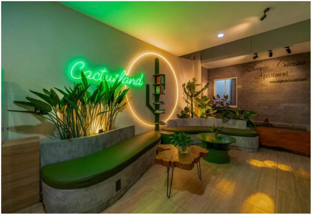 Reception Area of A hotel in Vietnam with illuminate green and yellow lighting.