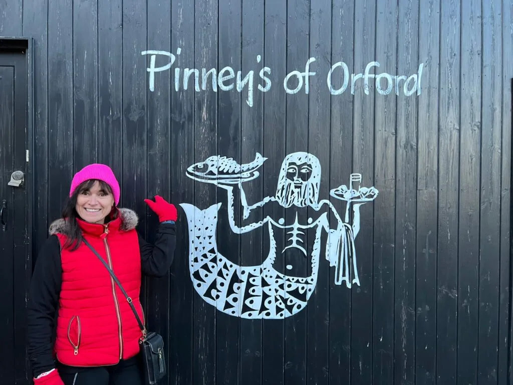 A woman at one of coastal towns of Suffolk visiting a country store.