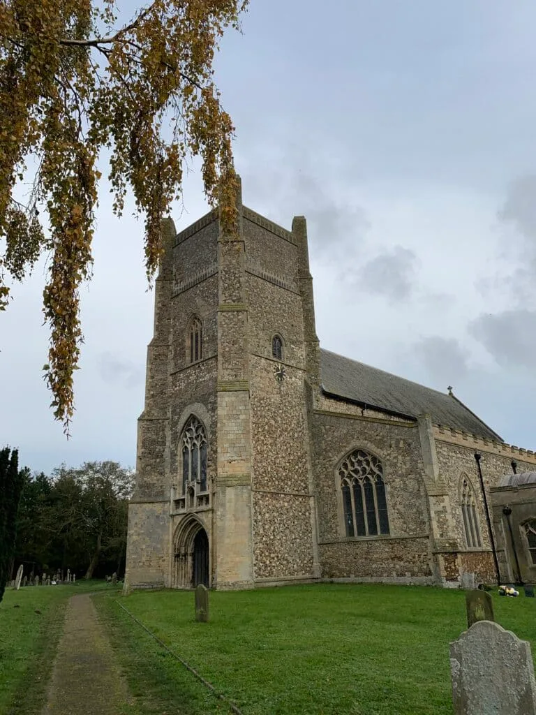 A church to visit when touring coastal towns of Suffolk. This is built of stone with a tower at the front above an large arch entryway.