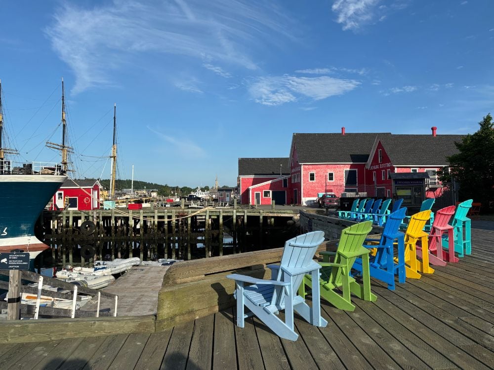 Colourful Adirondack chairs on the Lunenburg waterfront