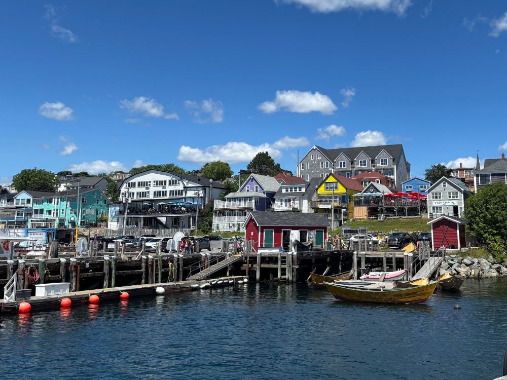 Colourful houses and boats in a Nova Scotia coastal harbour village