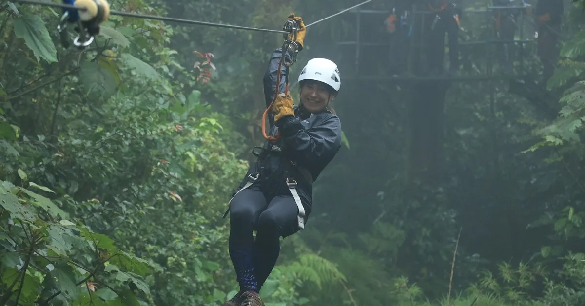 Woman zip-lining in Monteverde Cloud Forest Costa Rica.