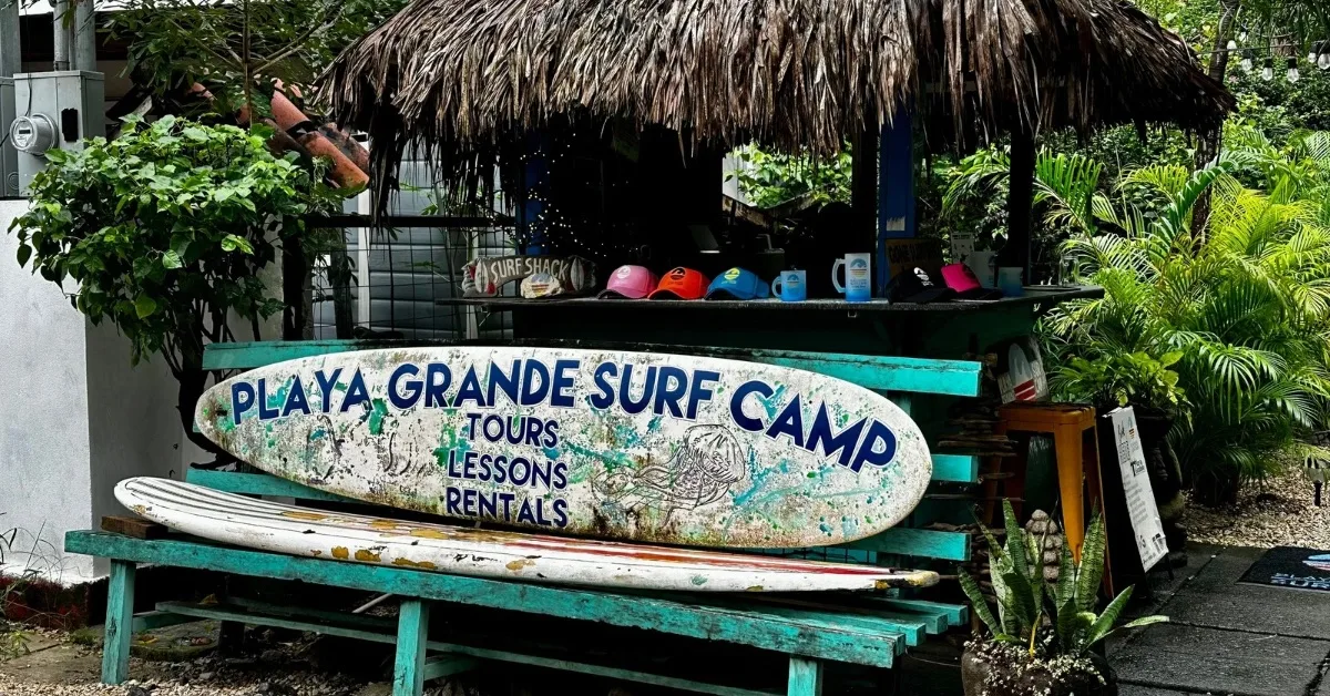 A surf camp within El Manglar Hotel advertises tours, lessons and rentals.