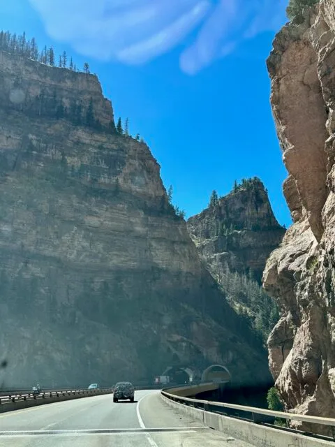 Driving through Glenwood Canyon with sheer rock on both sides