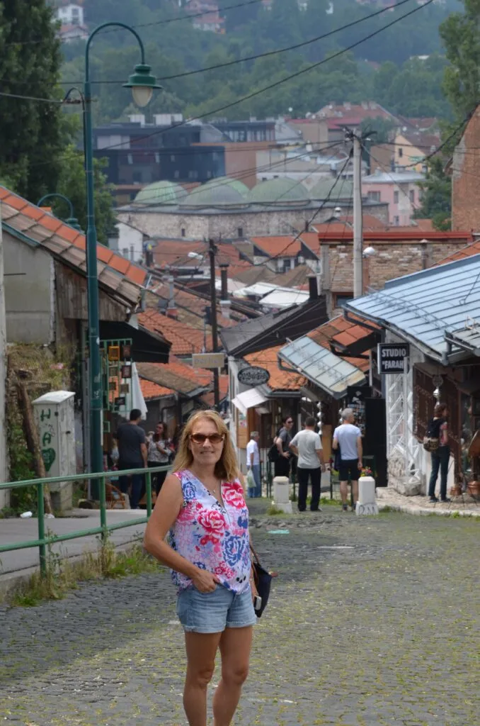 Women walking downhill in central Sarajevo