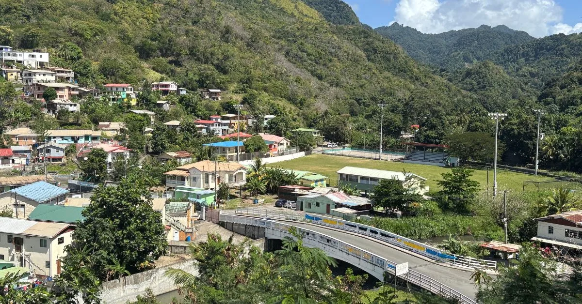 Village in St Lucia with a large bridge in centre of image.