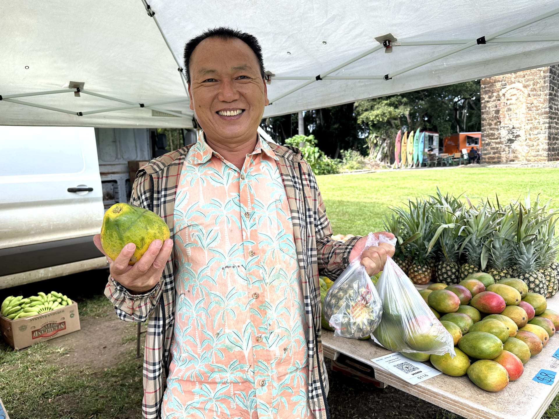 Koloa Town farmers stall selling fresh mangoes