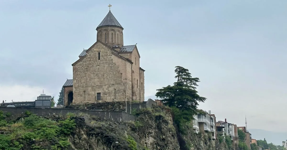 A church built of stone in Georgian style on top of a cliff in Tbilisi Georgia.