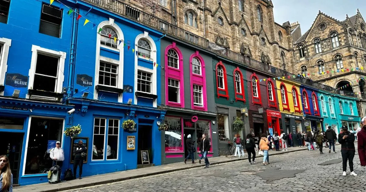 Victoria Street with colorful painted shops and restaurants in old town Edinburgh near the Royal Mile.