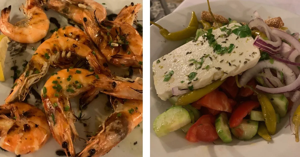 Typical Greek food of grilled prawns and a Greek salad