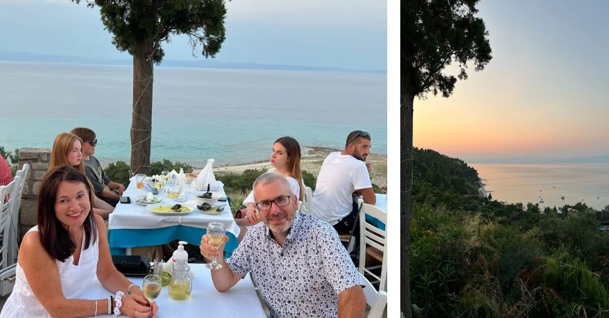 Couple dining by the sea and sunset sky