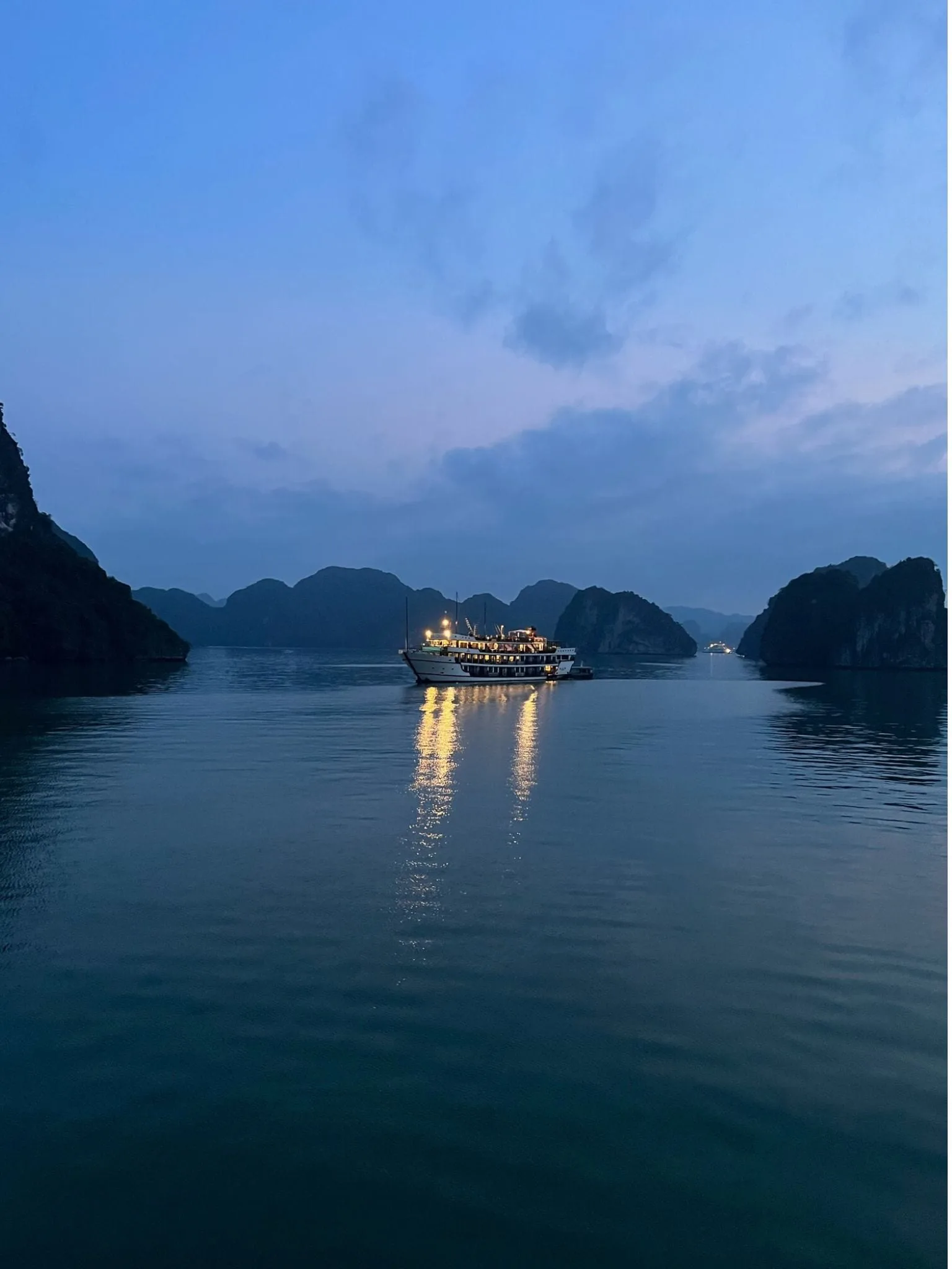 Halong Bay cruise ship at dusk