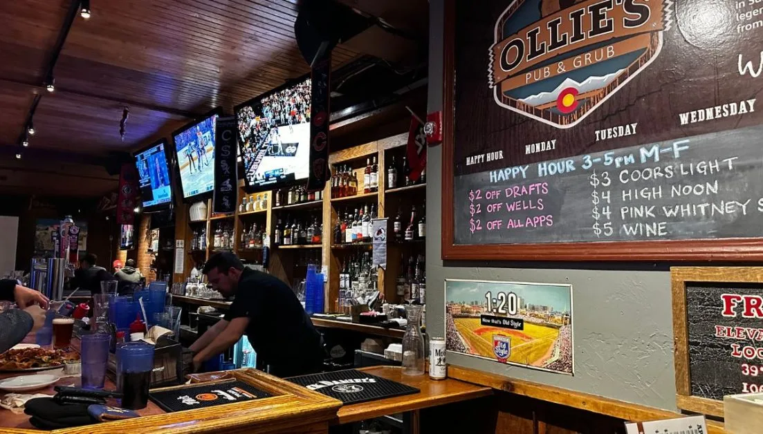 Ollie’s bar with Sports TVs and Happy Hour information. One of the popular happy hour places in Frisco co.