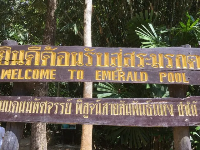 A sign welcoming visitors to The Emerald Pool near Krabi, Thailand