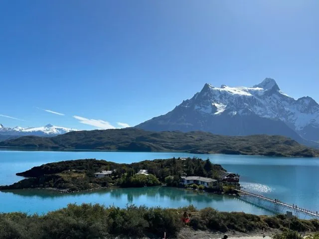 An island with bridge links to the mainland on Lake Pekoe Patagonia Chile.
