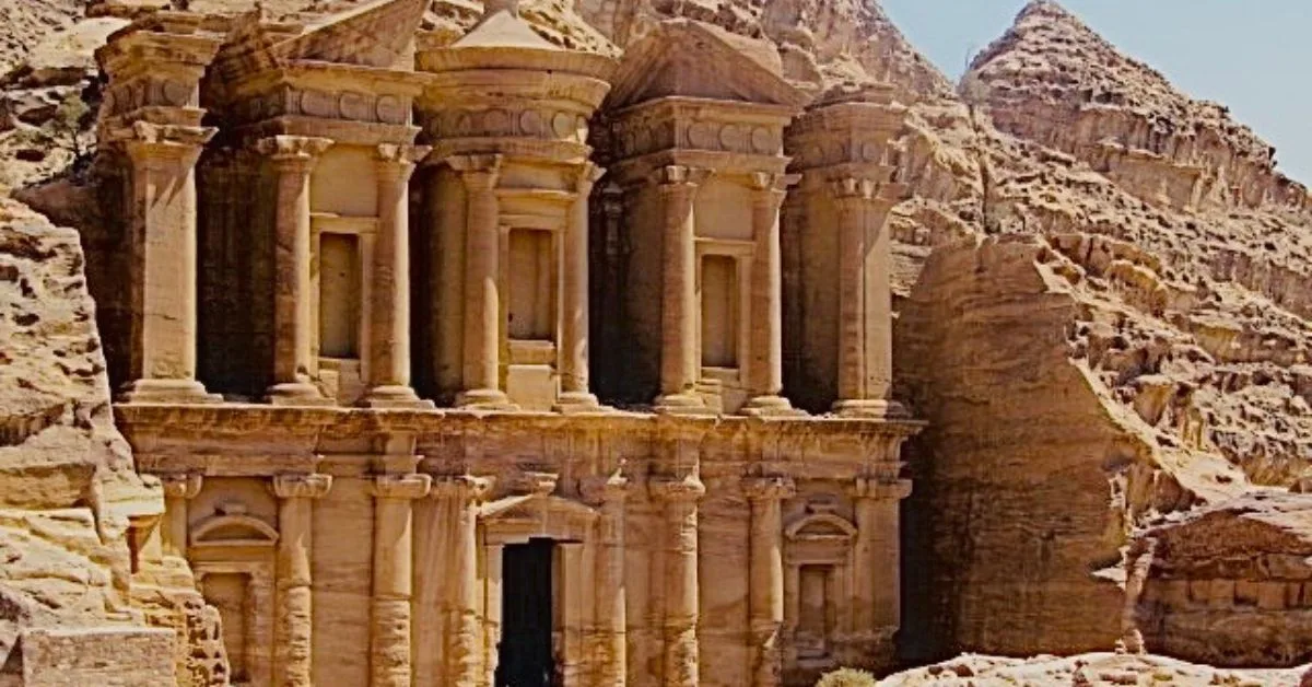 Ancient pillars of Petra. Jordan show carved sandstone structure I the desert.
