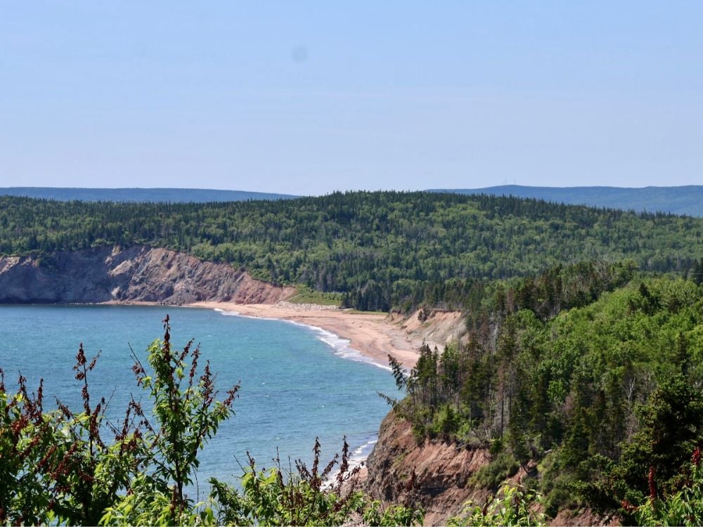 Ingonish Beach with sandy shoreline and coastal scenery, Cape Breton