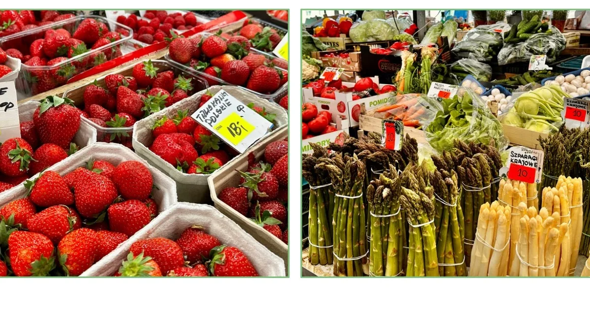 Market stalls displaying strawberries and asparagus for sale in Poznan.