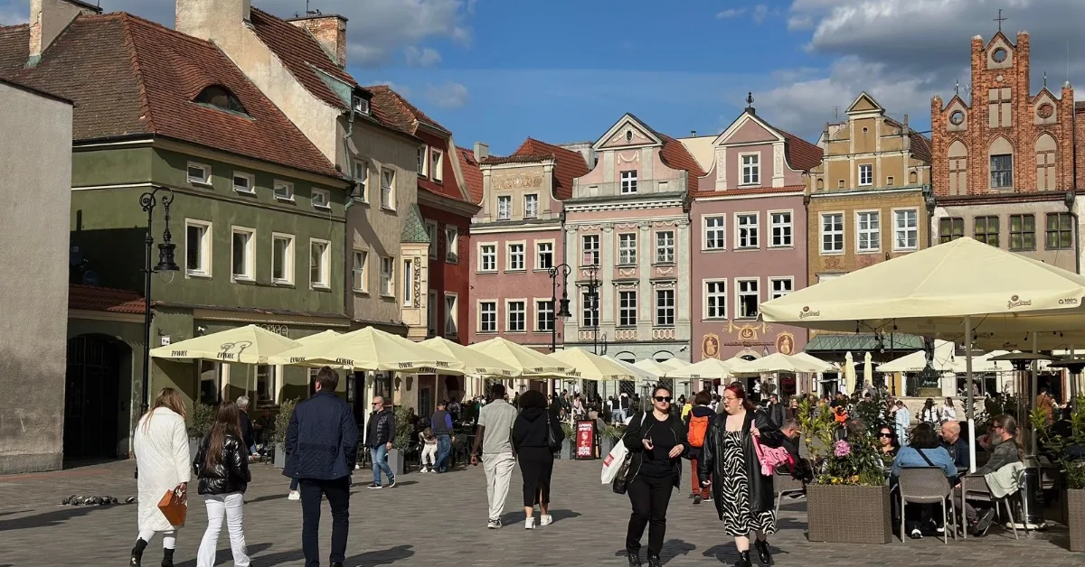 People strolling around Old Town Square one of the main reasons Poznan is worth visiting.