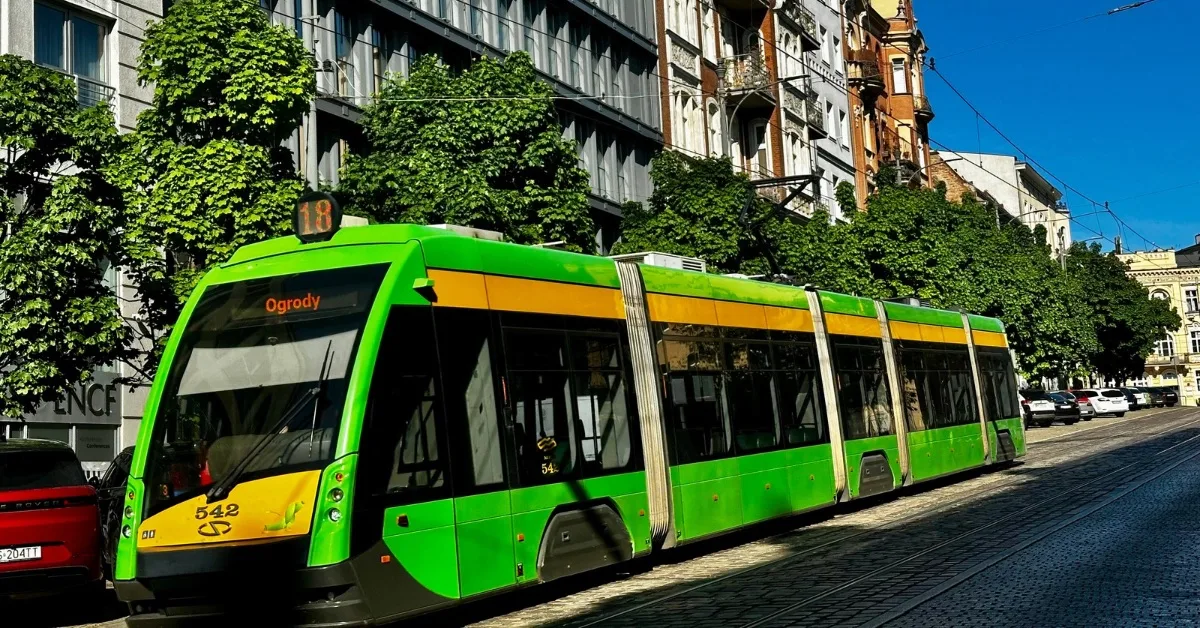 A street tram in Poznan with green and yellow colouring is an easy way to travel around the city.