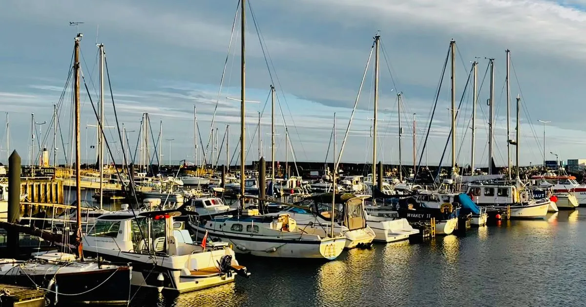 Sail boats moored at sunrise in Anstruther Harbour, Fife.