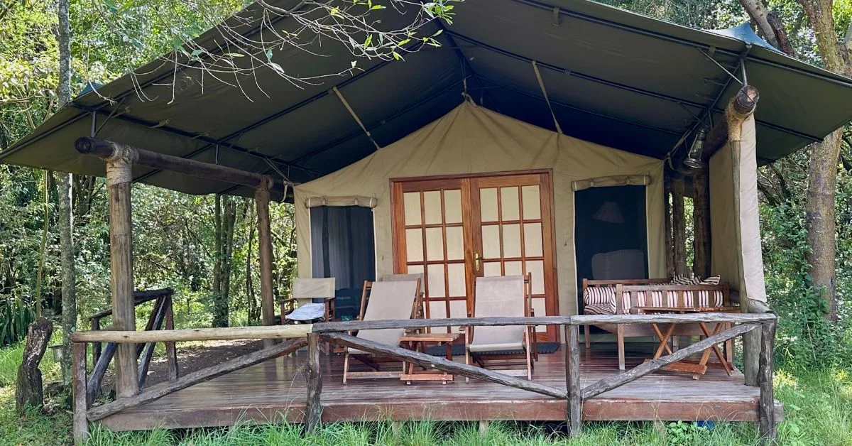 A brown canvas luxury tent at Karen Blixen Camp in Masai Mara Kenya