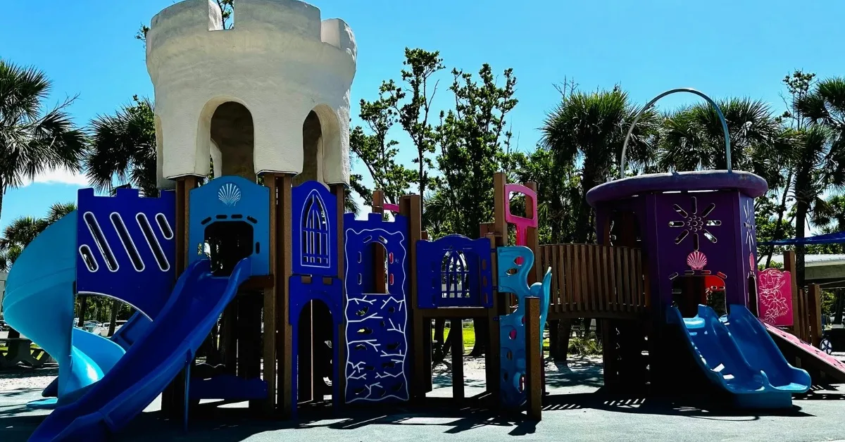 Playground at Siesta Key Main Beach with slides and climbing frames.