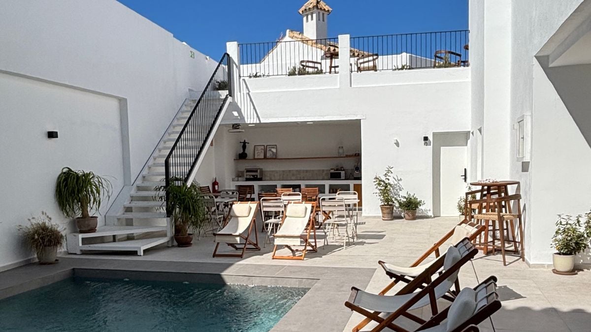 Maram Boutique Hotel courtyard and pool in Vejer de la Frontera, a luxury Andalusian hotel with whitewashed walls