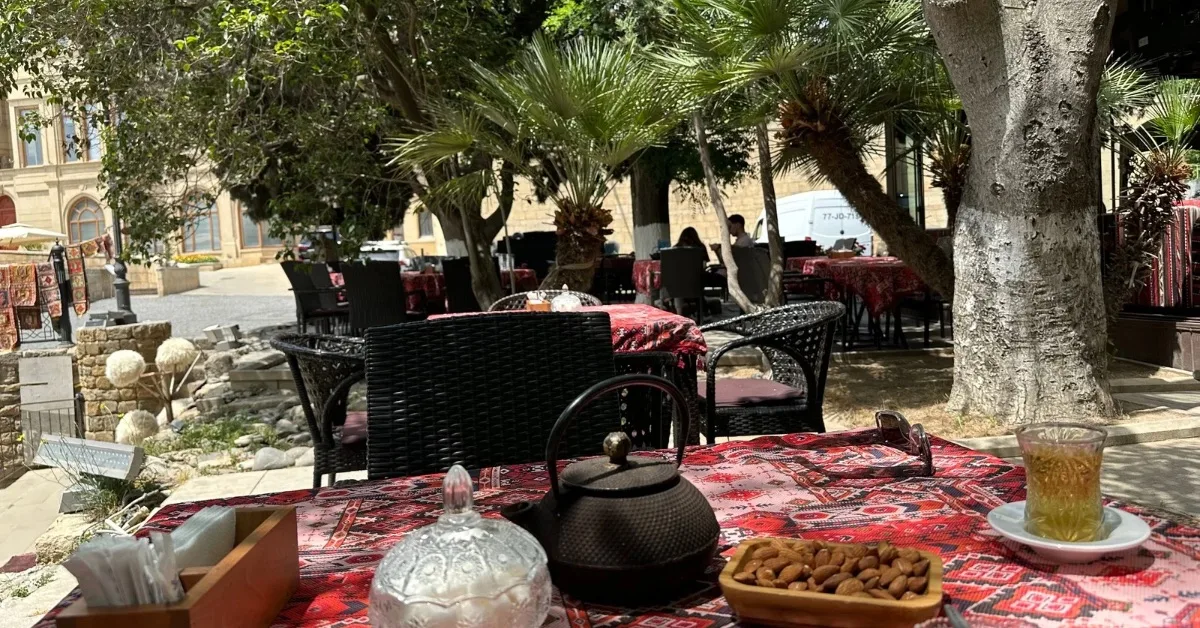Traditional cafe in Baku with tea, nuts and fruits served.