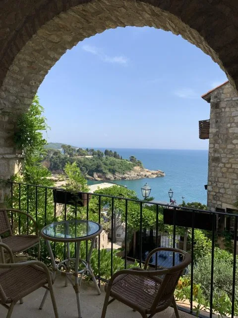 Arch way made of brick frames views to the sea in Ulcinj, Montenegro.