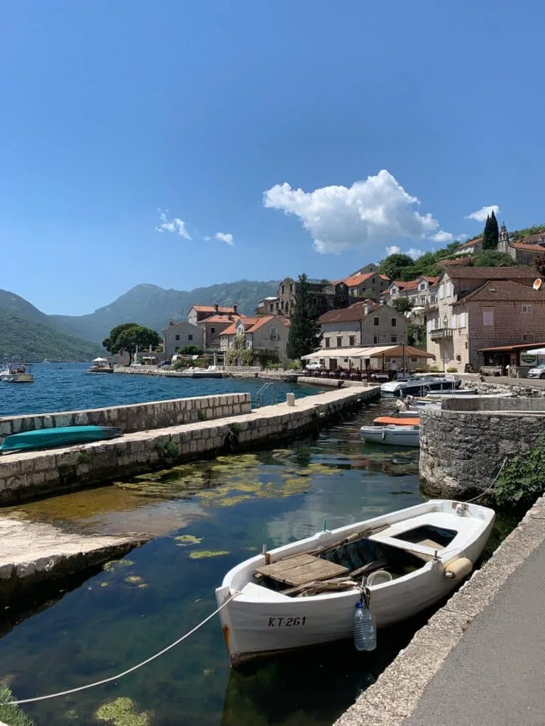 A dock where tourists arrive to in the village of Perast.