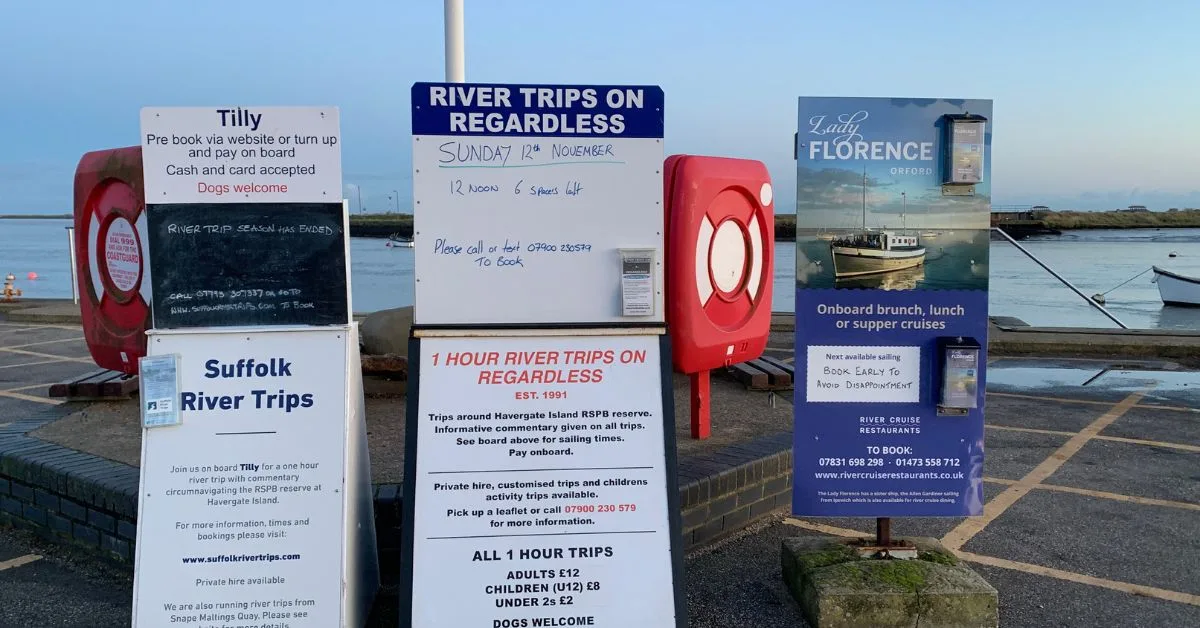 Signs at Orford Quay about River Trips