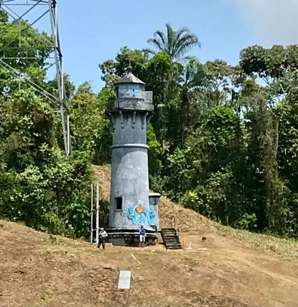 An old look out tower stands on the bank of the Chagres River.