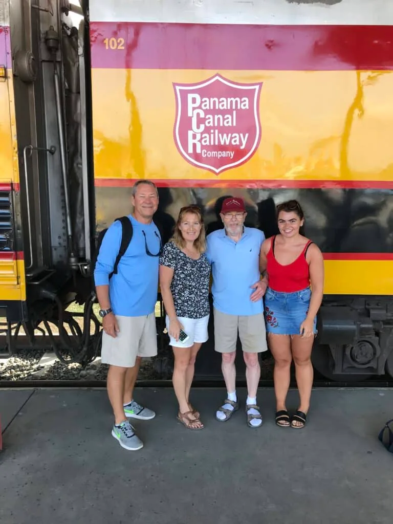 All aboard - family getting ready to board a Panama railroad train